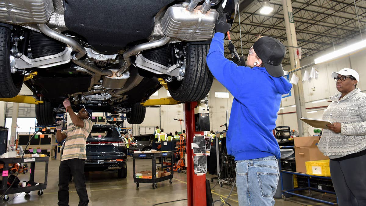 More Ford workers say faulty snack machines got them fired