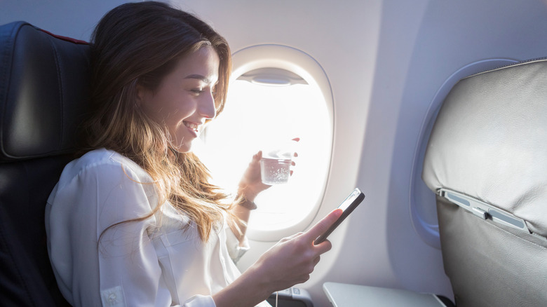 The disgusting spot near your plane seat to avoid touching, per a flight attendant
