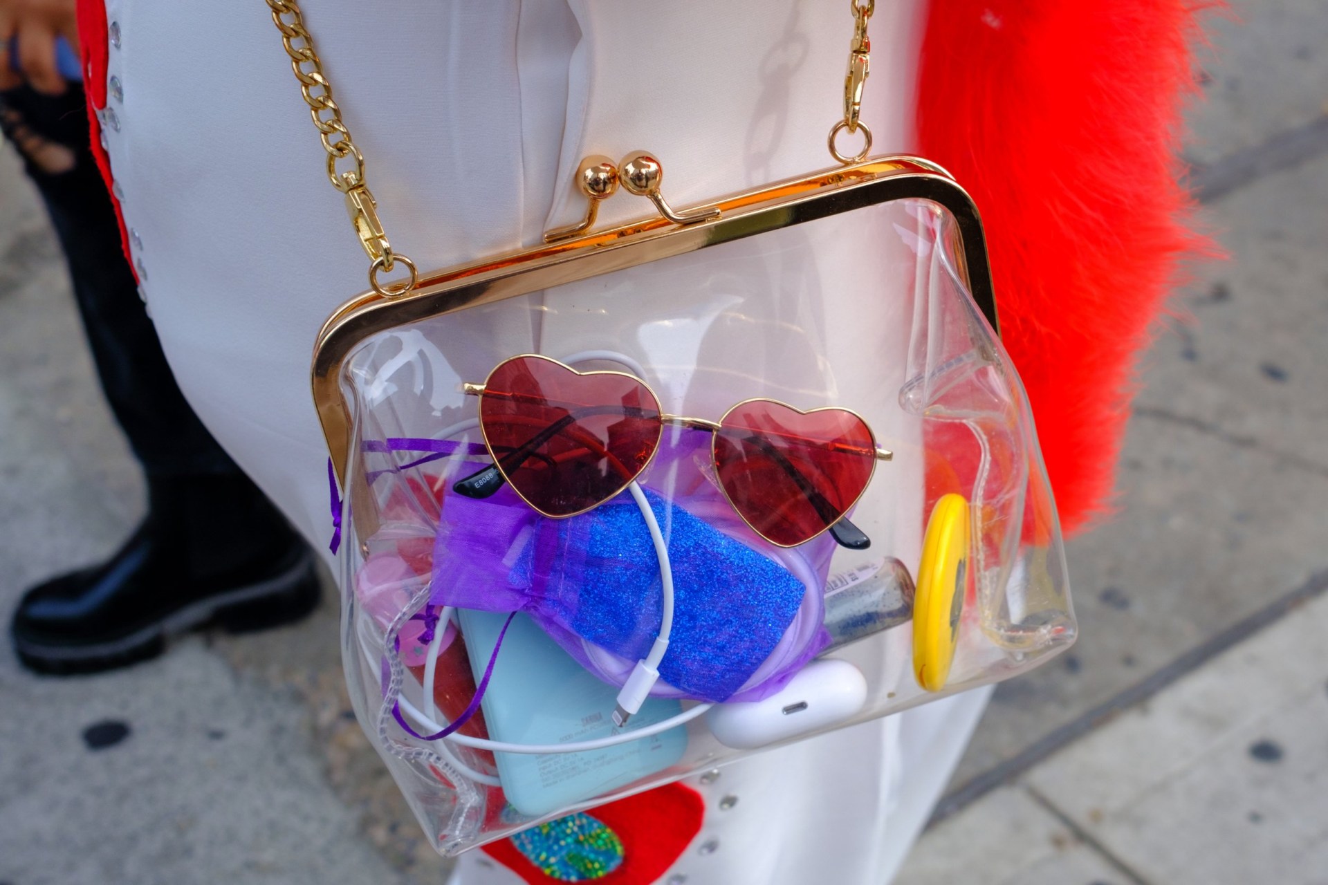 NEW YORK, NEW YORK - AUGUST 21: A close up of a woman's clear purse displaying heart glasses before the Harry Styles Love On Tour 2022 concert at Madison Square Garden on August 21, 2022 in New York City. Styles??? Love On Tour 2022 is at Madison Square Garden for 15 nights beginning August 20 until September 21. (Photo by Alexi Rosenfeld/Getty Images)