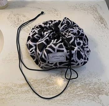 Drawstring makeup bag closed