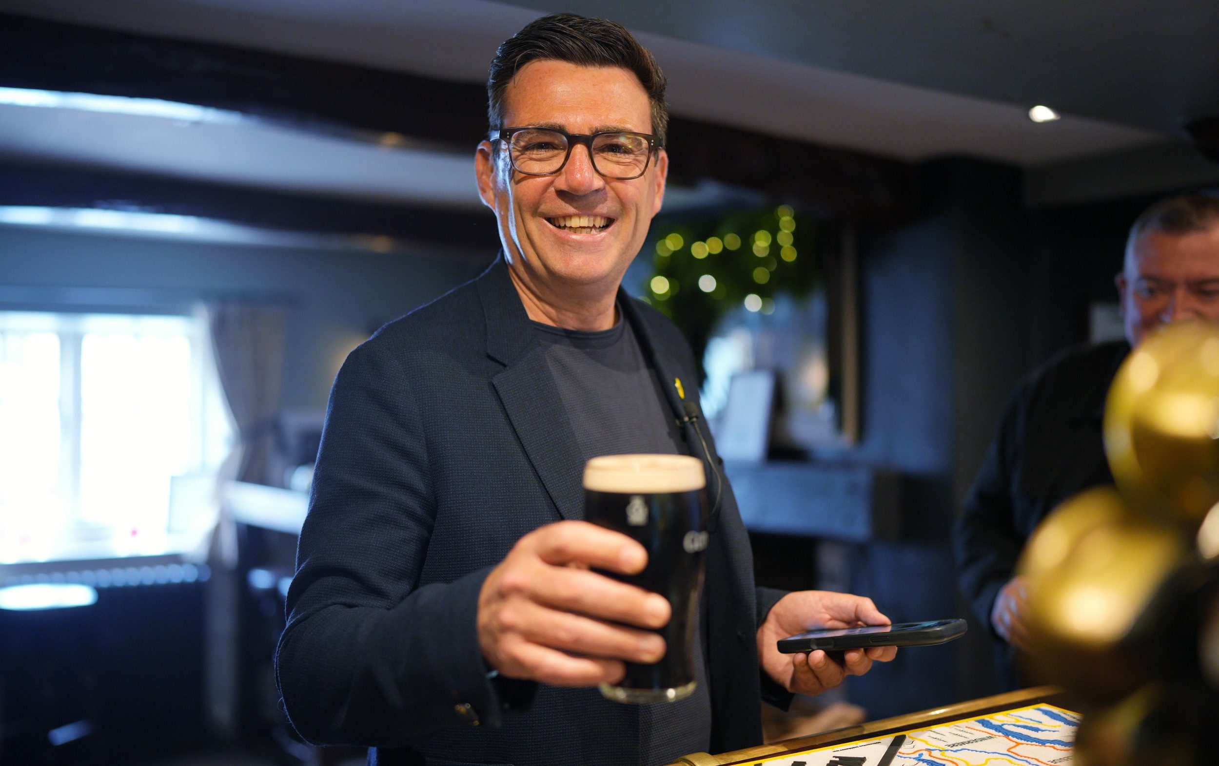 Andy Burnham, the Prime Minister, with a pint of Guinness