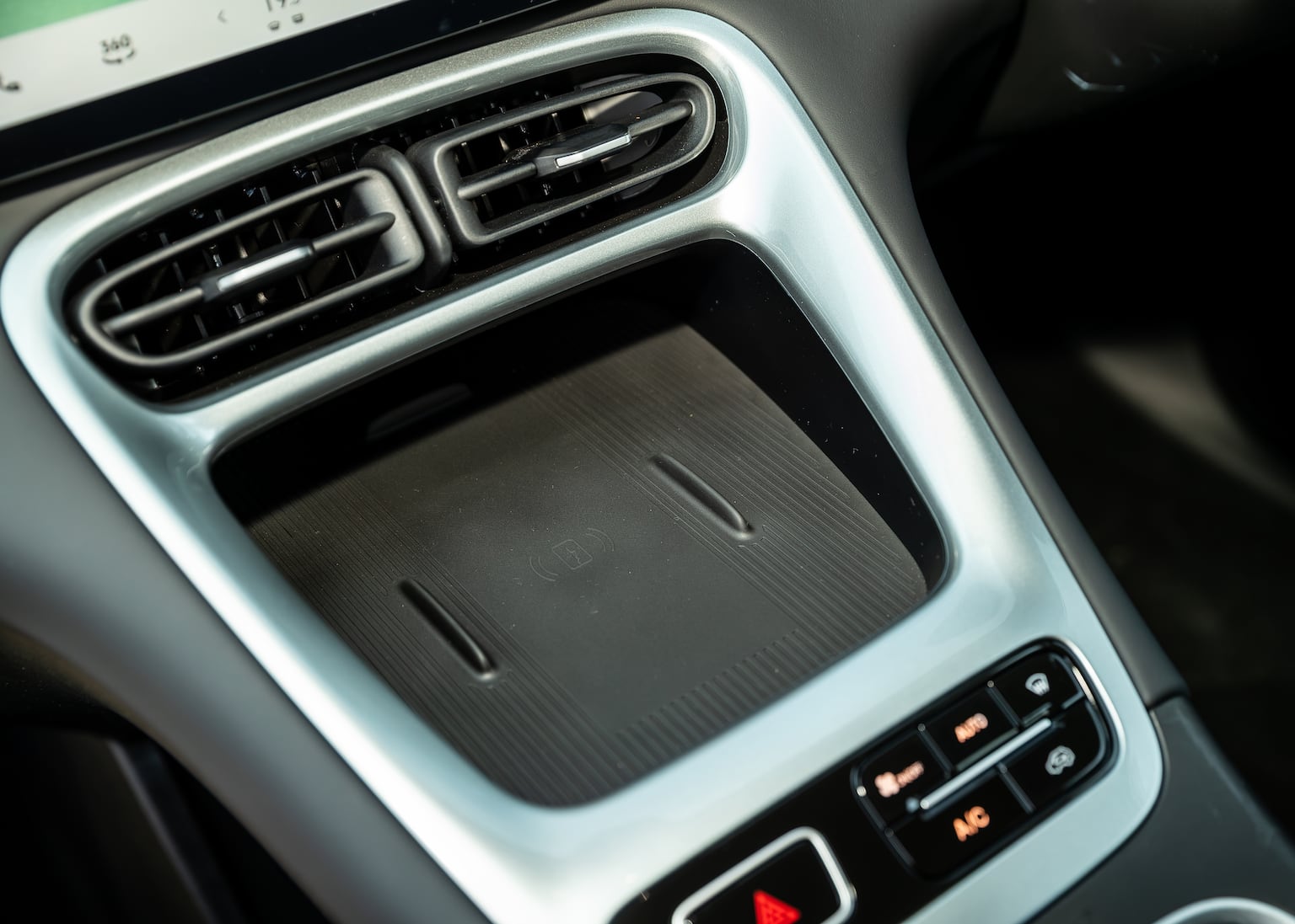 The wireless smartphone charging tray is handily located
