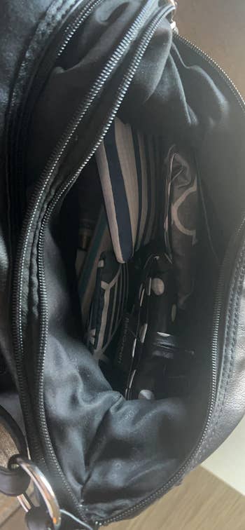 open bag with collapsible shopping back inside