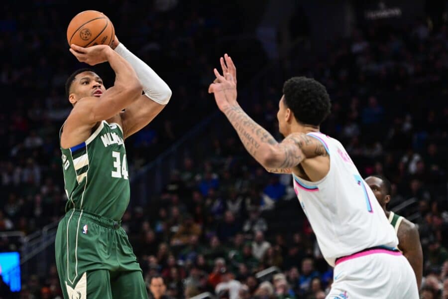 Jan 23, 2025; Milwaukee, Wisconsin, USA; Milwaukee Bucks forward Giannis Antetokounmpo (34) takes a shot against Miami Heat center Kel’el Ware (7) in the first quarter at Fiserv Forum. Mandatory Credit: Benny Sieu-Imagn Images