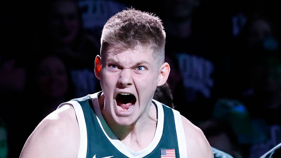 Michigan State's Jaxon Kohler yells after being introduced as a starter before a game against Northwestern