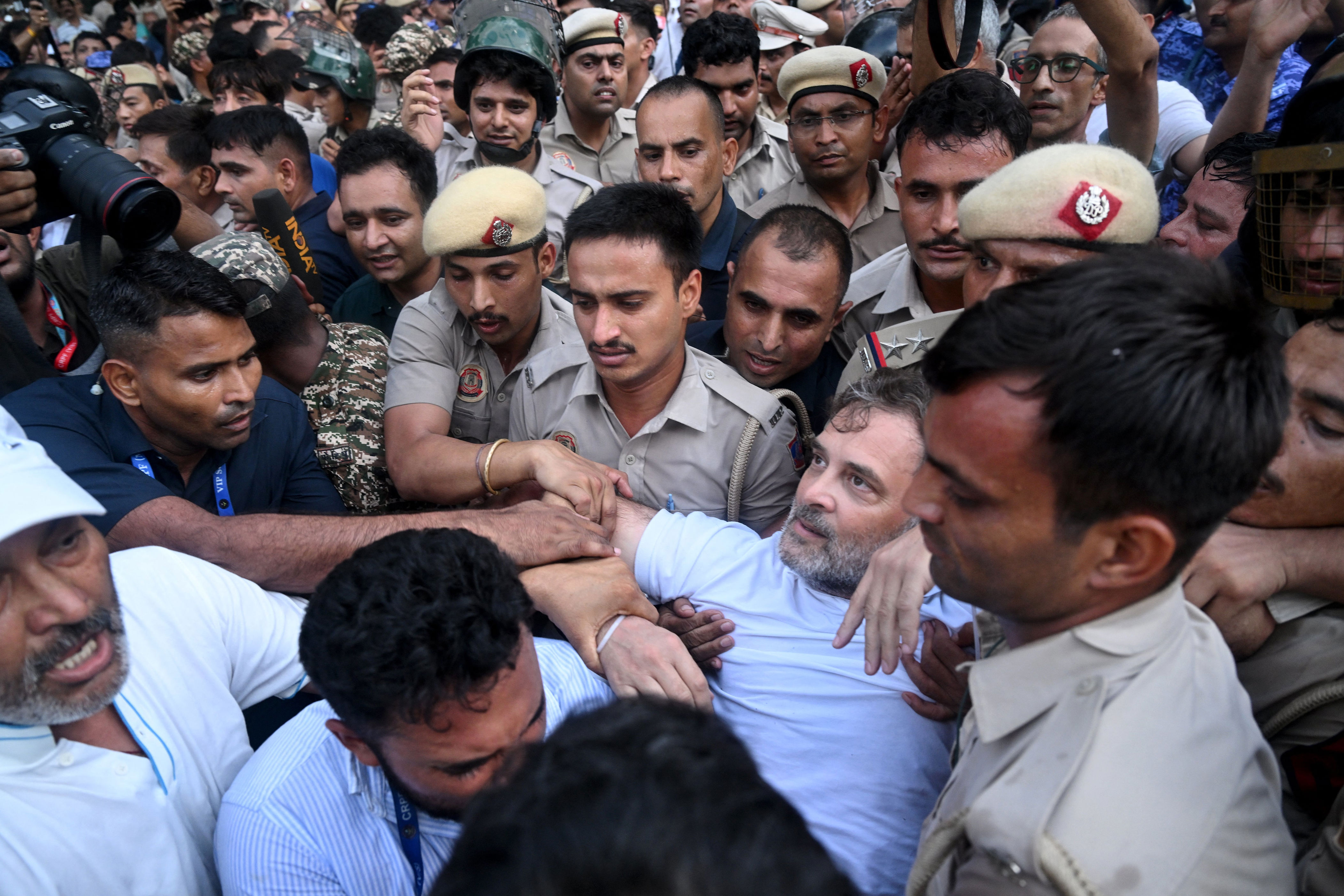 Security personnel detain India's Opposition Leader Rahul Gandhi (front 2R) as he stages a sit-in protest calling for Prime Minister Narendra Modi's resignation outside the latter's residence in New Delhi (AFP/Getty)