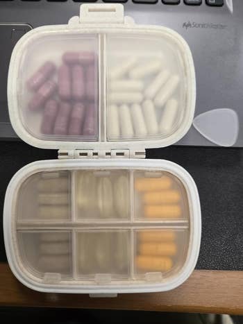 pill organizer filled with supplements