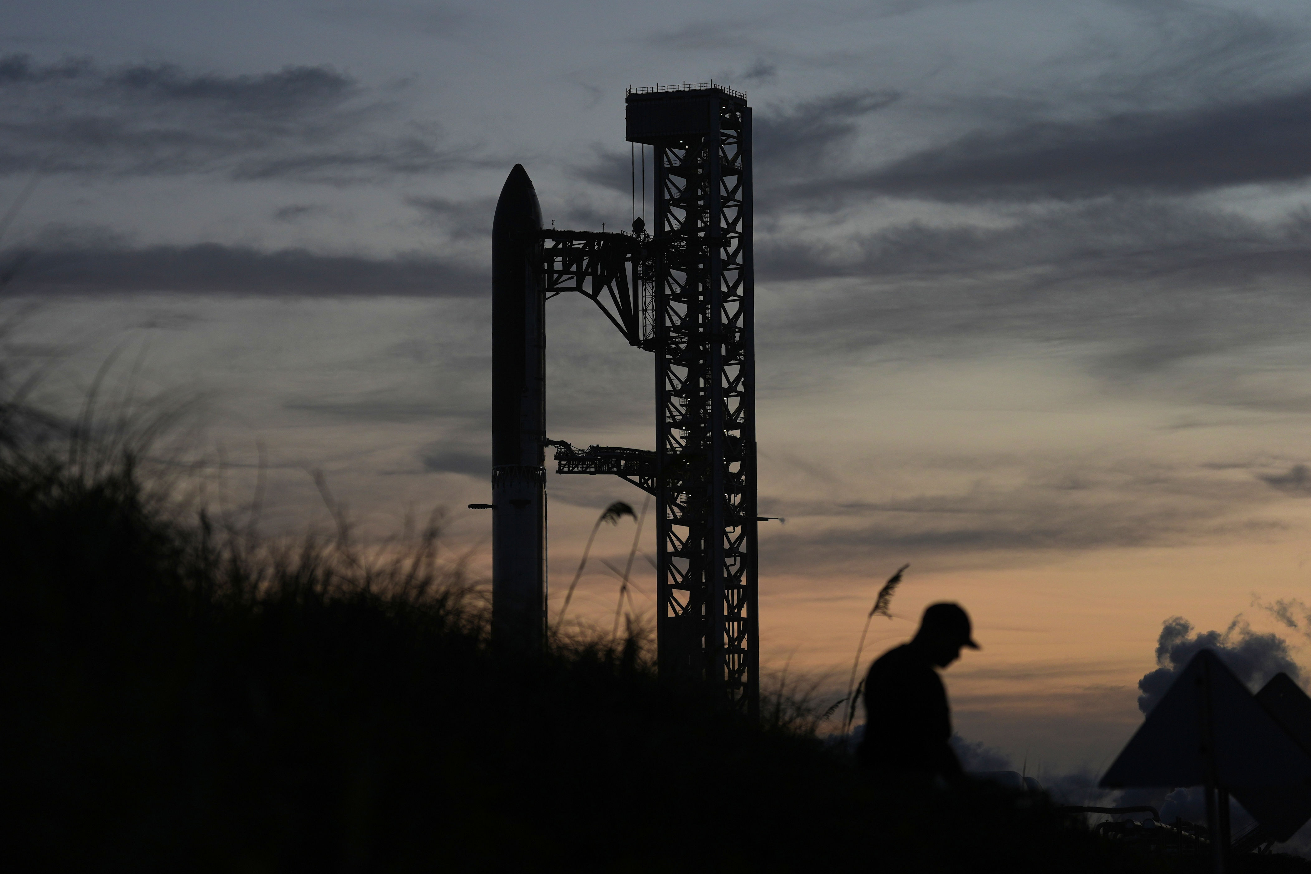 SpaceX's mega rocket Starship sits on the launch pad after its test flight was aborted when some of the engines failed to ignite, in Starbase, Texas, Thursday, July 16, 2026. (AP Photo/Eric Gay)
