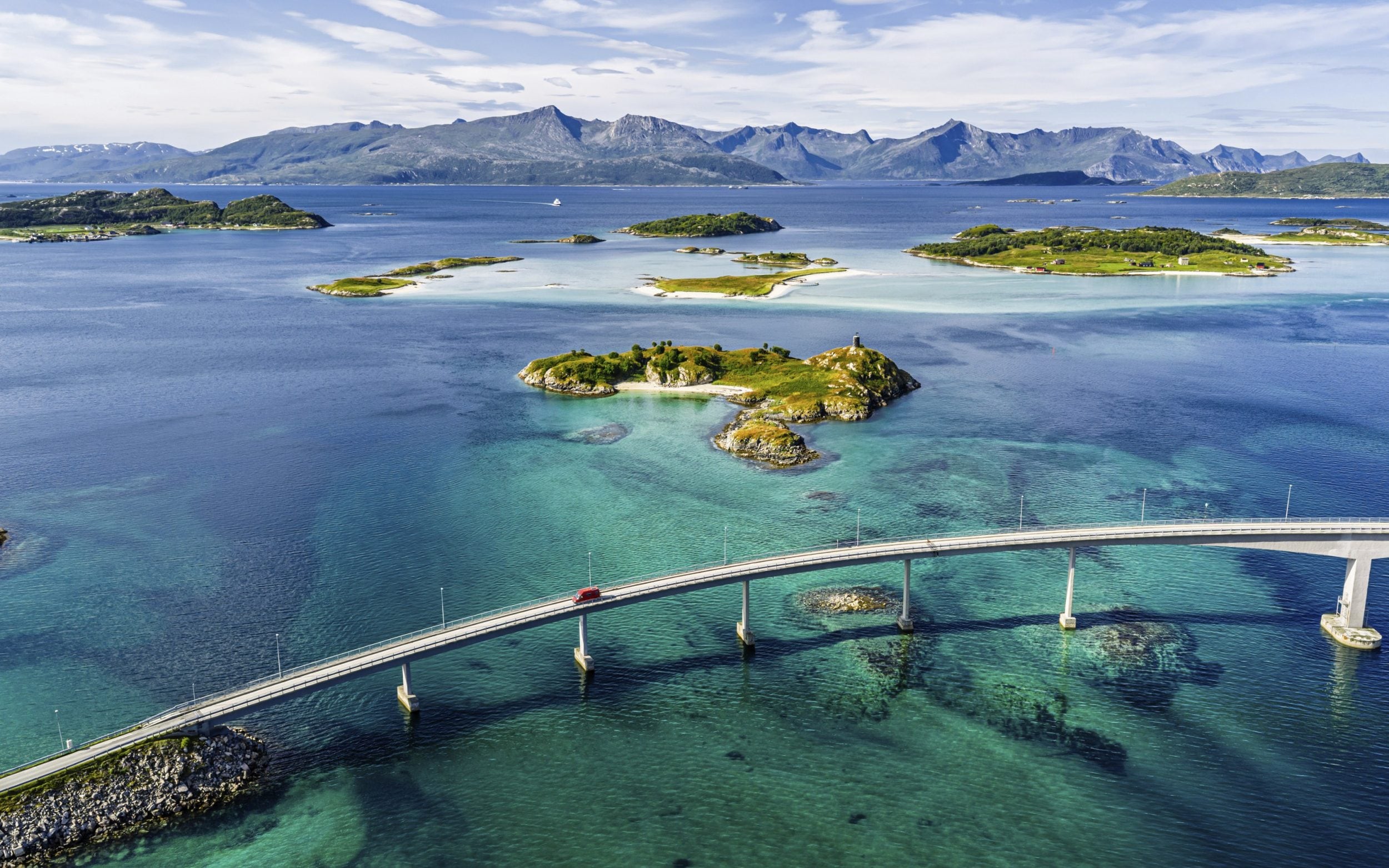 A narrow bridge connects the island of Kvaløya to the fishing village of Sommarøy