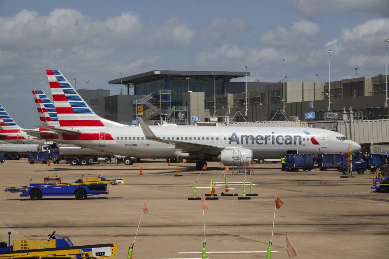 American Airlines airplanes are parked at Austin-Bergstrom International Airport on June 30, 2026 in Austin, Texas
