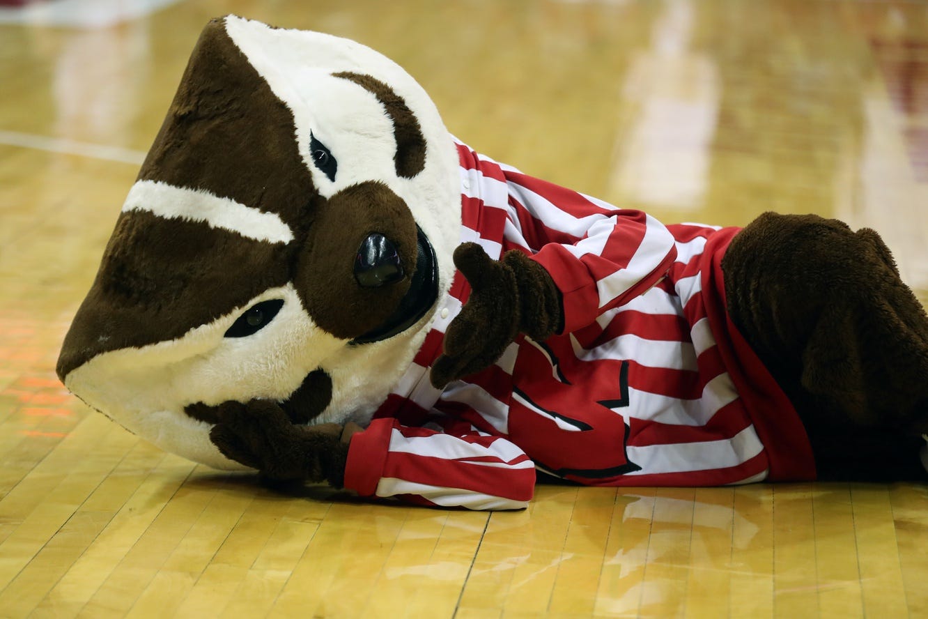Dec 29, 2021; Madison, Wisconsin, USA; Wisconsin Badgers mascot Bucky Badger plays around on the court before the game with the Illinois State Redbirds at the Kohl Center. Mandatory Credit: Mary Langenfeld-USA TODAY Sports
