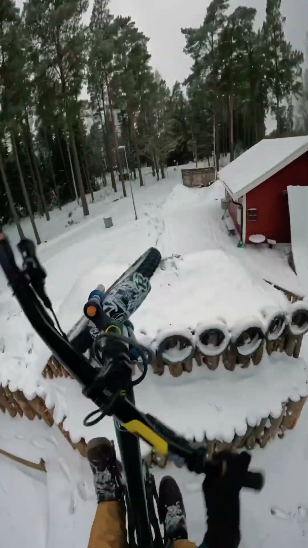 Taking a big jump on a snowy course!