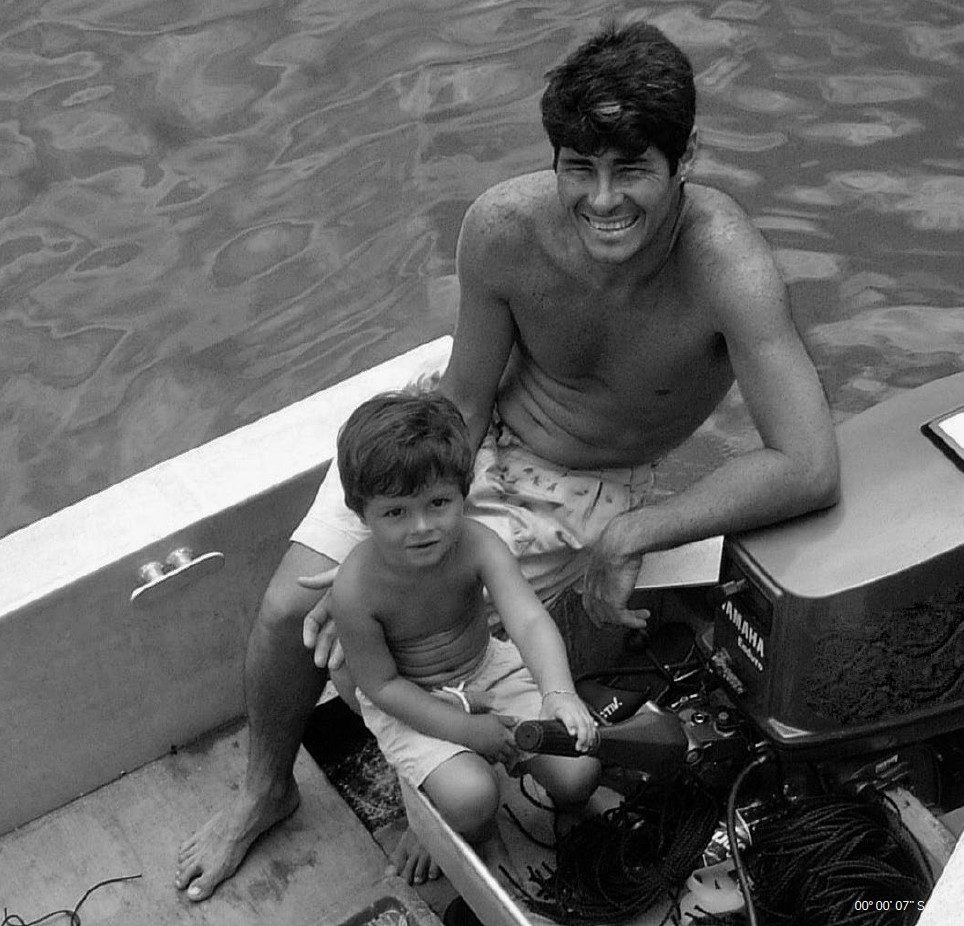 Titouan Bernicot pictured as a child with his father in French Polynesia
