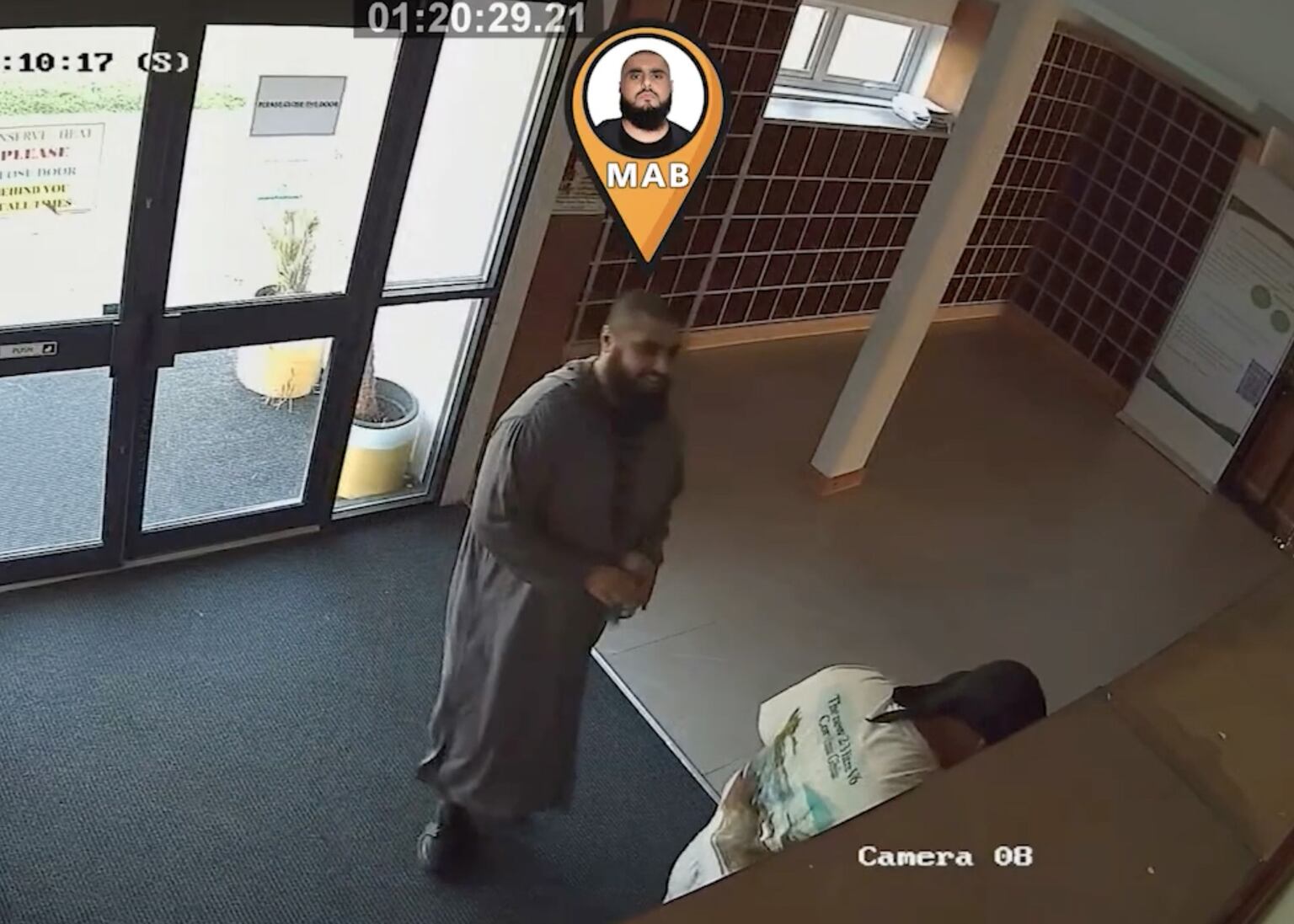 Handout grab taken from CCTV issued by Greater Manchester Police of Mohammad Bashir and Jihad Al-Shamie at the Al Sunnah Mosque in Manchester, where they mistakenly believed they had hidden from the cameras and that their conversations would not be overheard