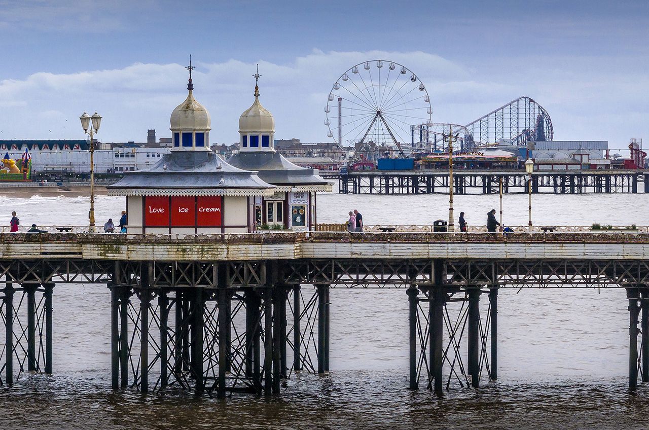 An aerial view showing the North Pier, Central Pier and the Pleasure Beach in the Blackpool South parliamentary constituency on April 11, 2024 in Blackpool, England.