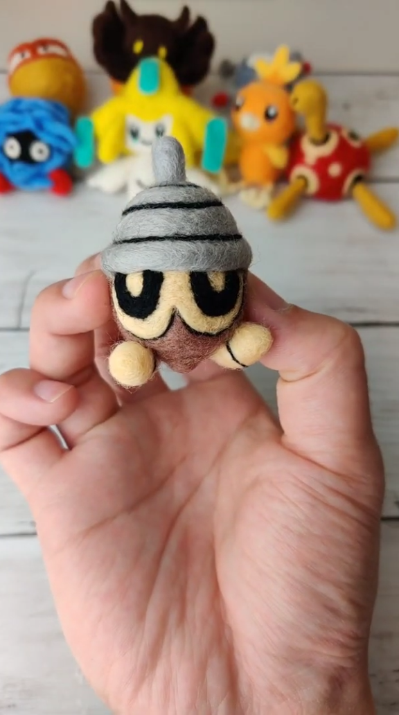 Handmade Seedot wool art brings a cute Pokémon craft to life