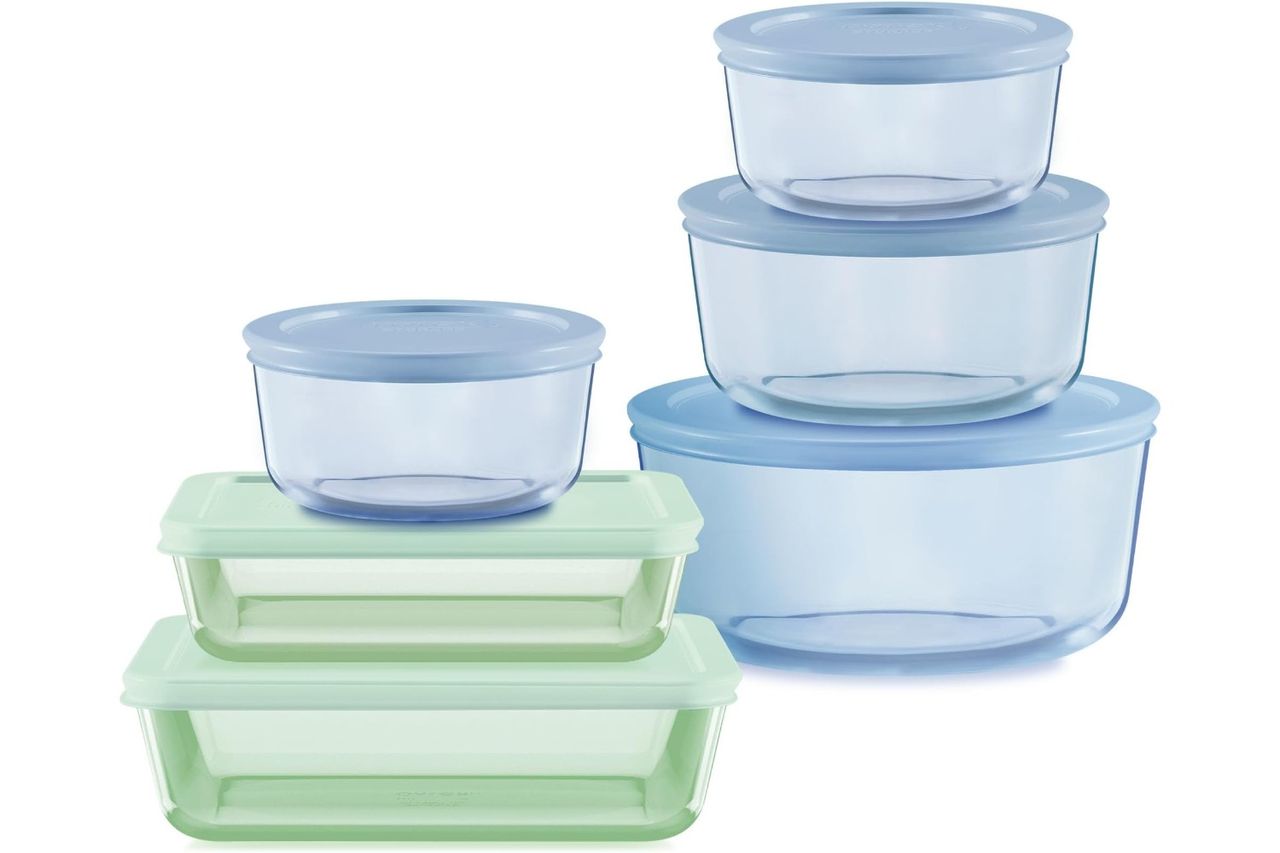 A set of 12 food storage containers with lids including bowls and rectangular containers
