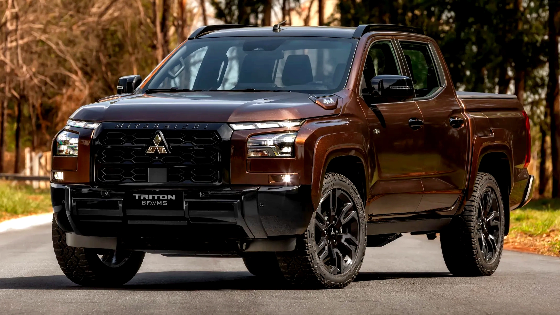 Mitsubishi’s $71,200 brown pickup projects a horse onto the pavement