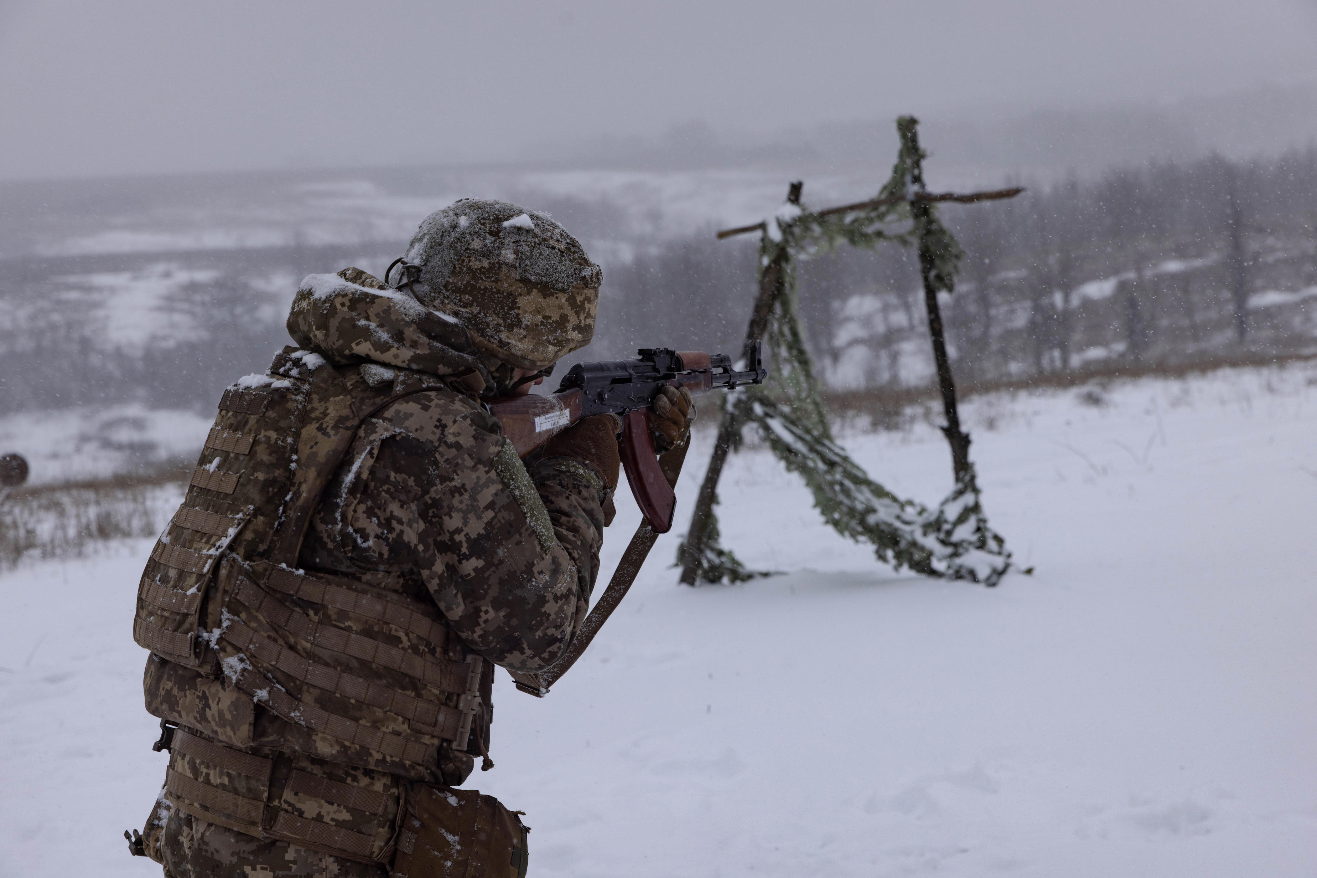 KHARKIV OBLAST, UKRAINE - DECEMBER 28: Ukrainian servicemen of the 72nd Mechanized Brigade practice with firearms during military training near the frontline in Kharkiv region on December 28, 2025, in Kharkiv Oblast, Ukraine.