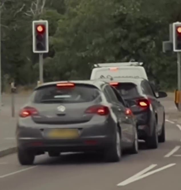 This is the moment a female driver screams abuse at Nigel Farage before crashing her car seconds later