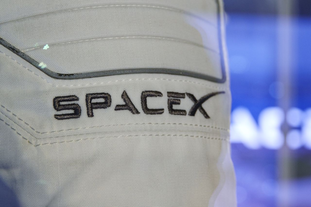 A SpaceX logo on a space suit.