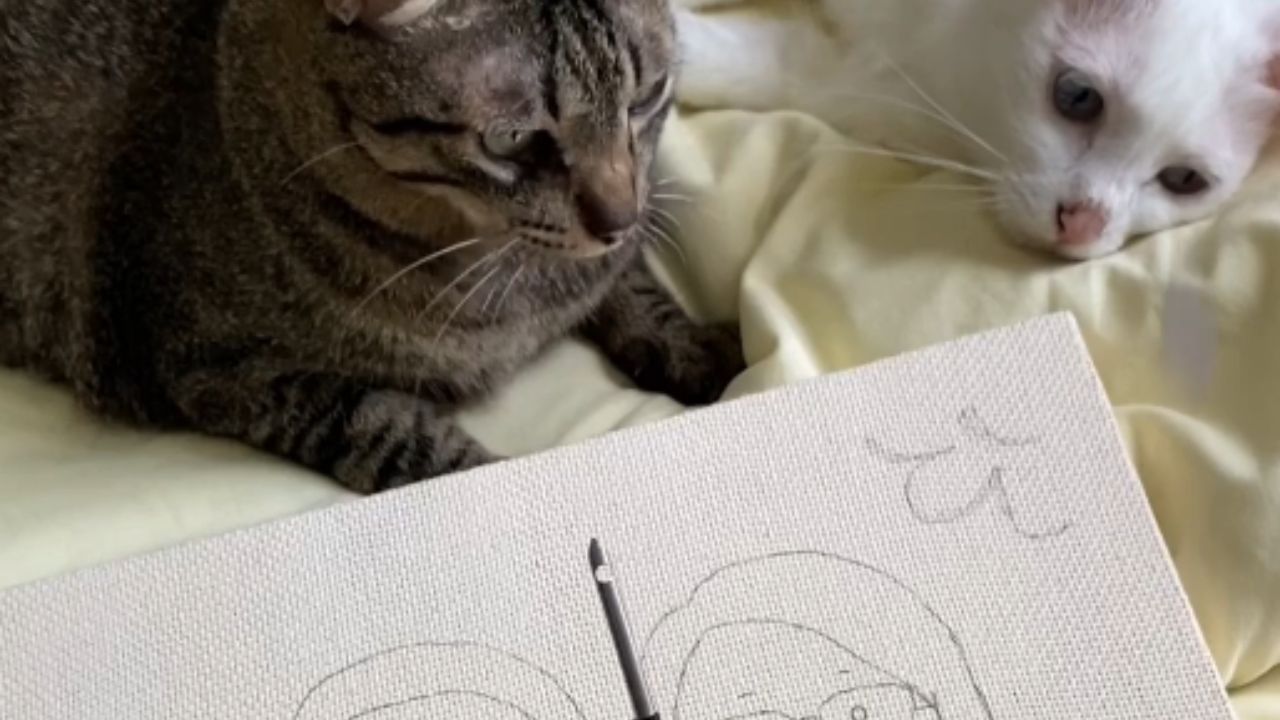 artist-crafts-a-painting-with-punch-needle-embroidery-on-a-canvas