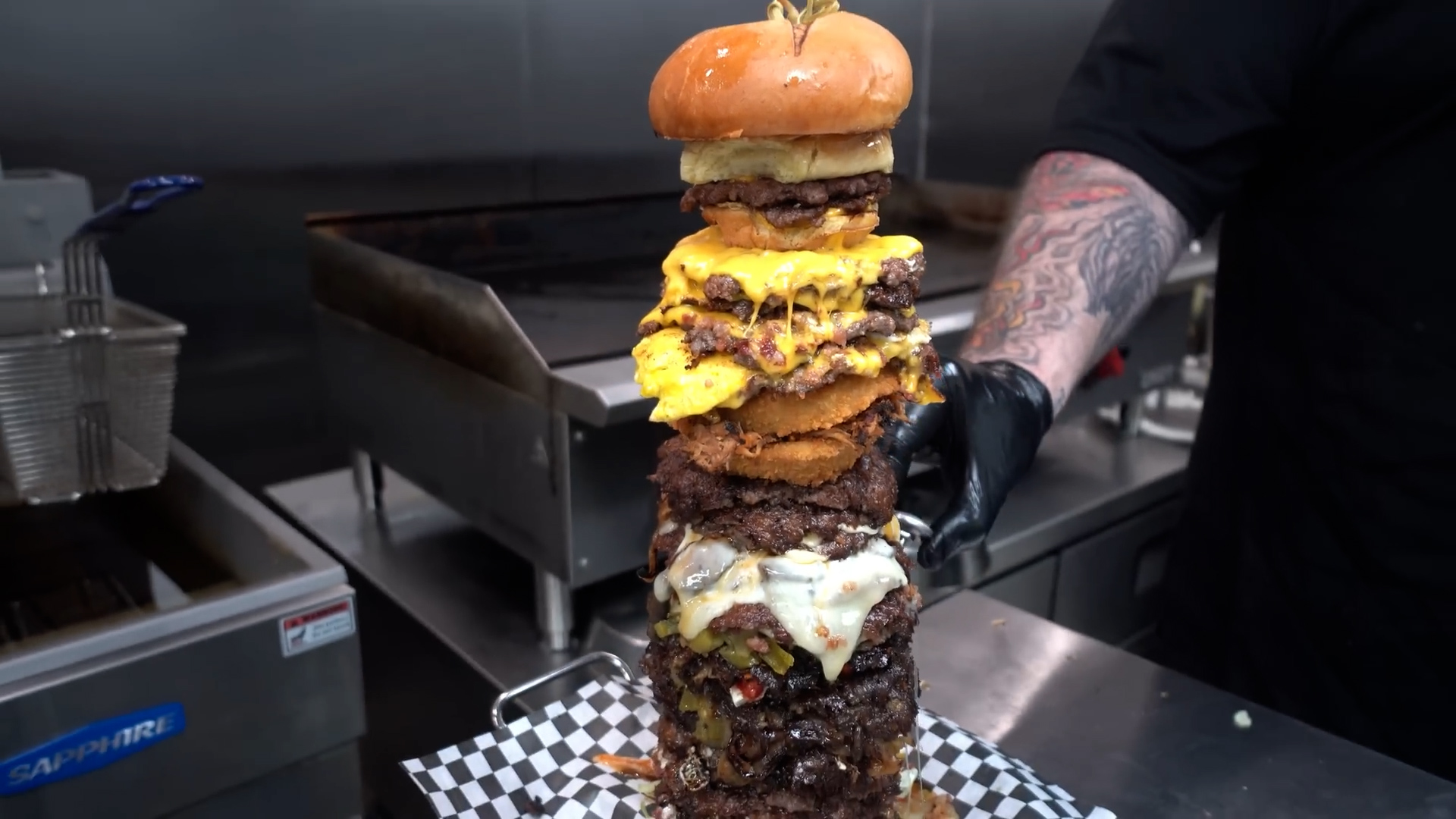 Man attempts giant kitchen sink burger challenge - can he win?