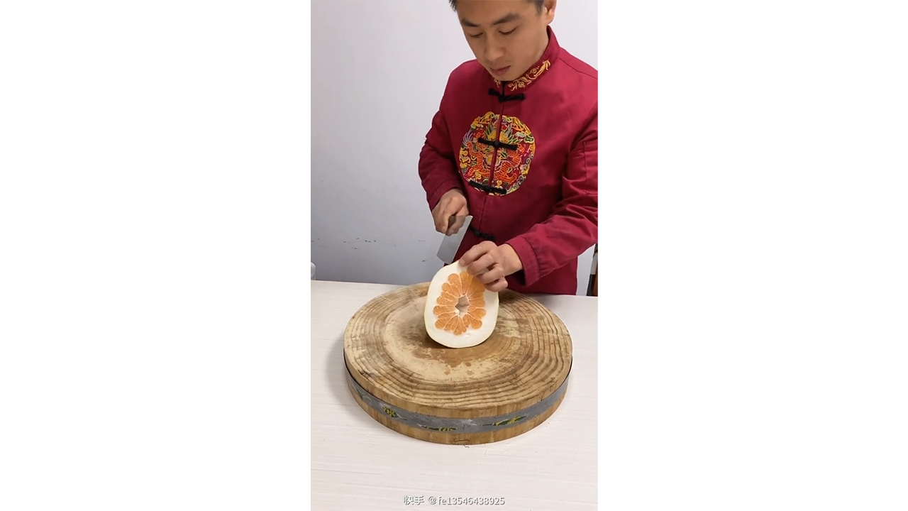 Peeling pomelo with sharp knife creating clean and satisfying results