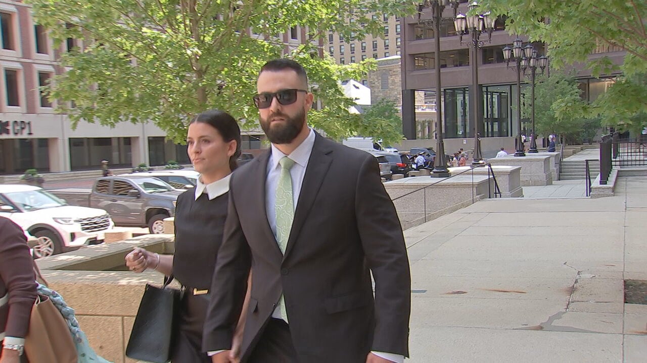 Boston officer charged in deadly shooting of carjacking suspect due ...