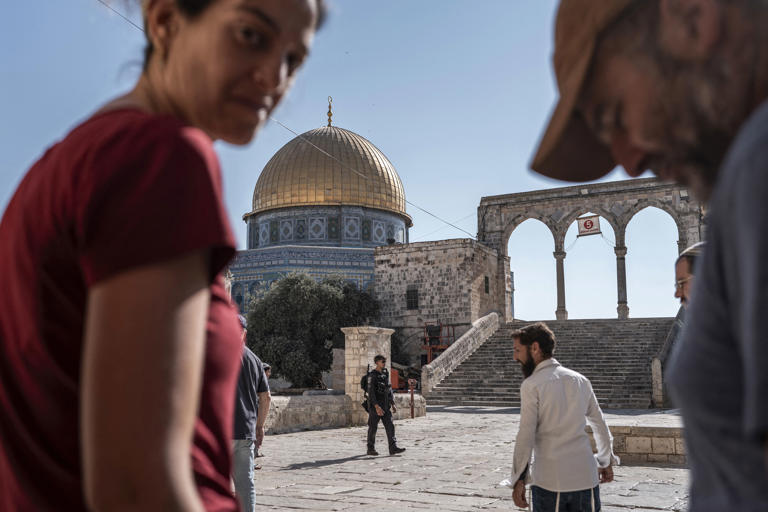 Israeli settlers at Al-Aqsa Mosque compound in occupied East Jerusalem on July 23 [File: Ilia Yefimovich /AFP]