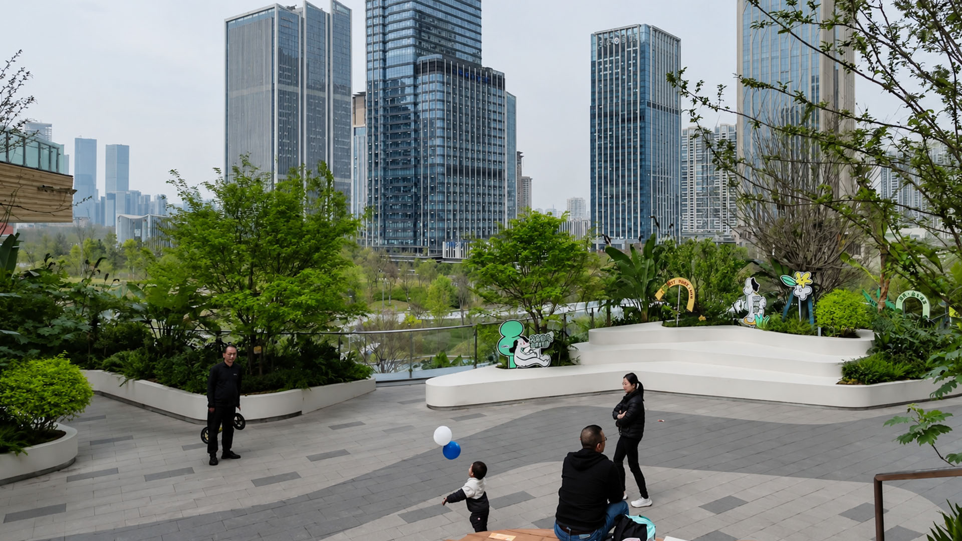 China's urban rooftop park combines lush greenery with towering glass ...