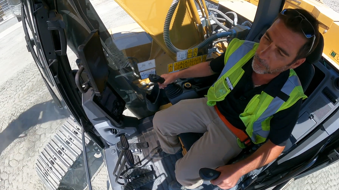 Professional excavator operator showcases advanced machine operation