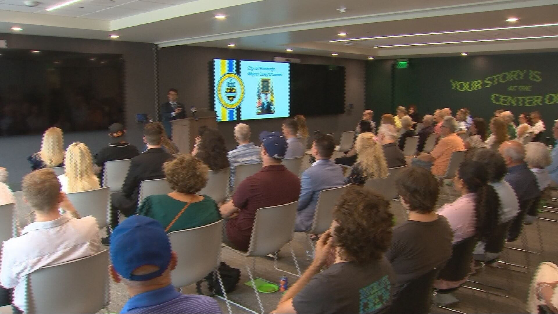 Strip District residents gather to oppose new townhome development, taxing plans