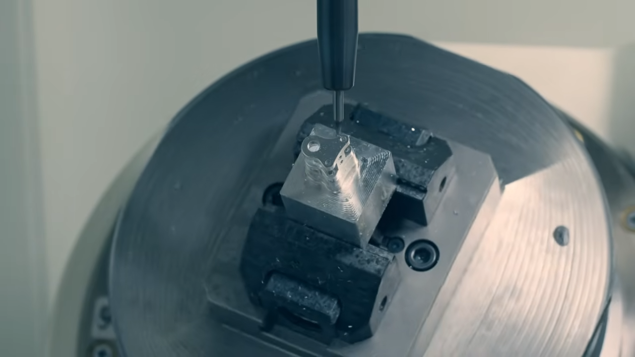 This machine spins parts 360° and makes normal CNC look painfully slow