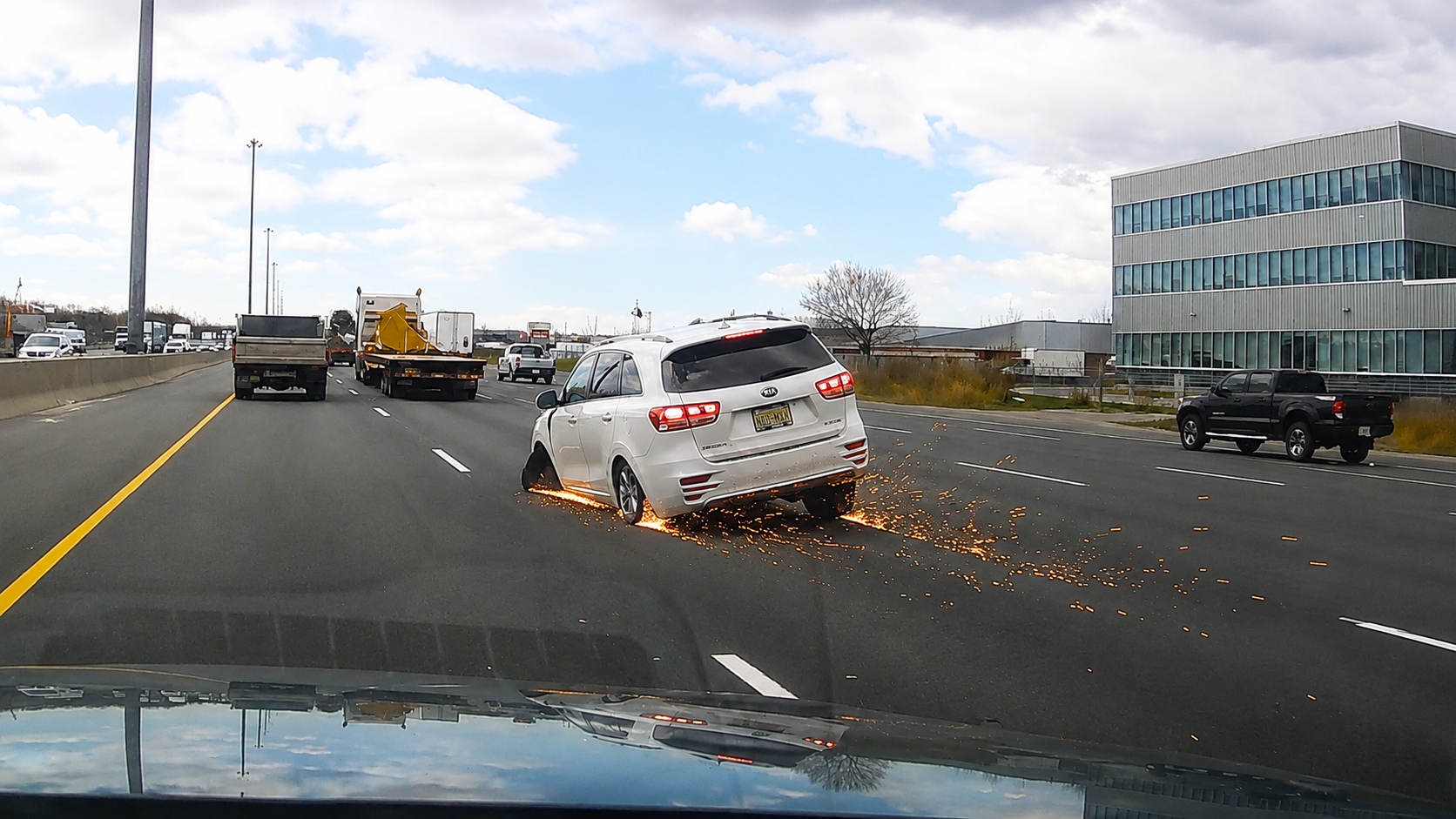 He lost his wheel on the highway - then a shower of sparks erupted on ...