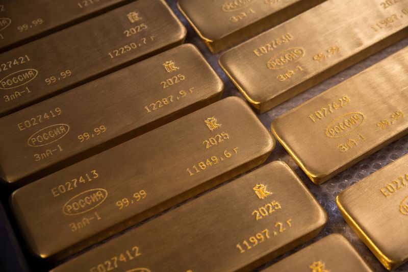 Gold slips as US dollar regains footing; heads for first monthly gain in five