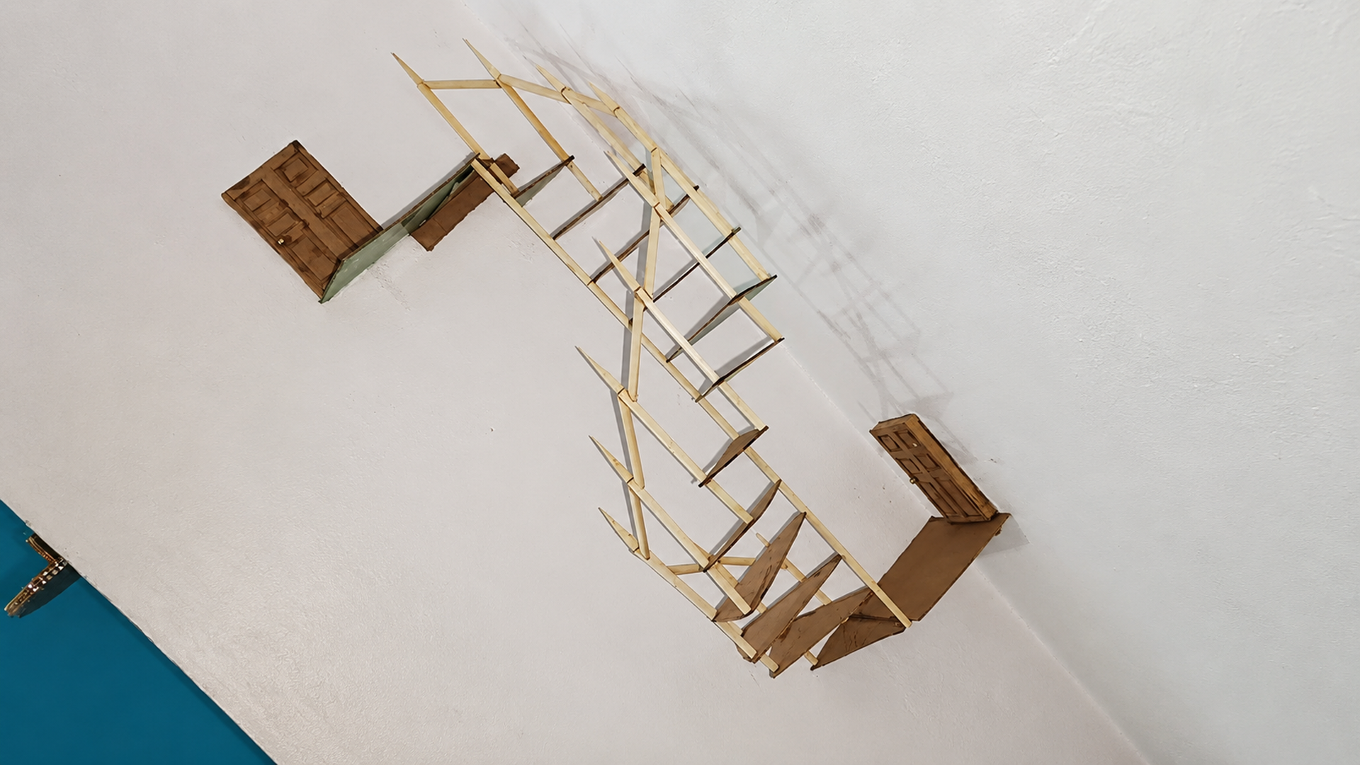 Transforming cardboard waste into a miniature spiral staircase craft