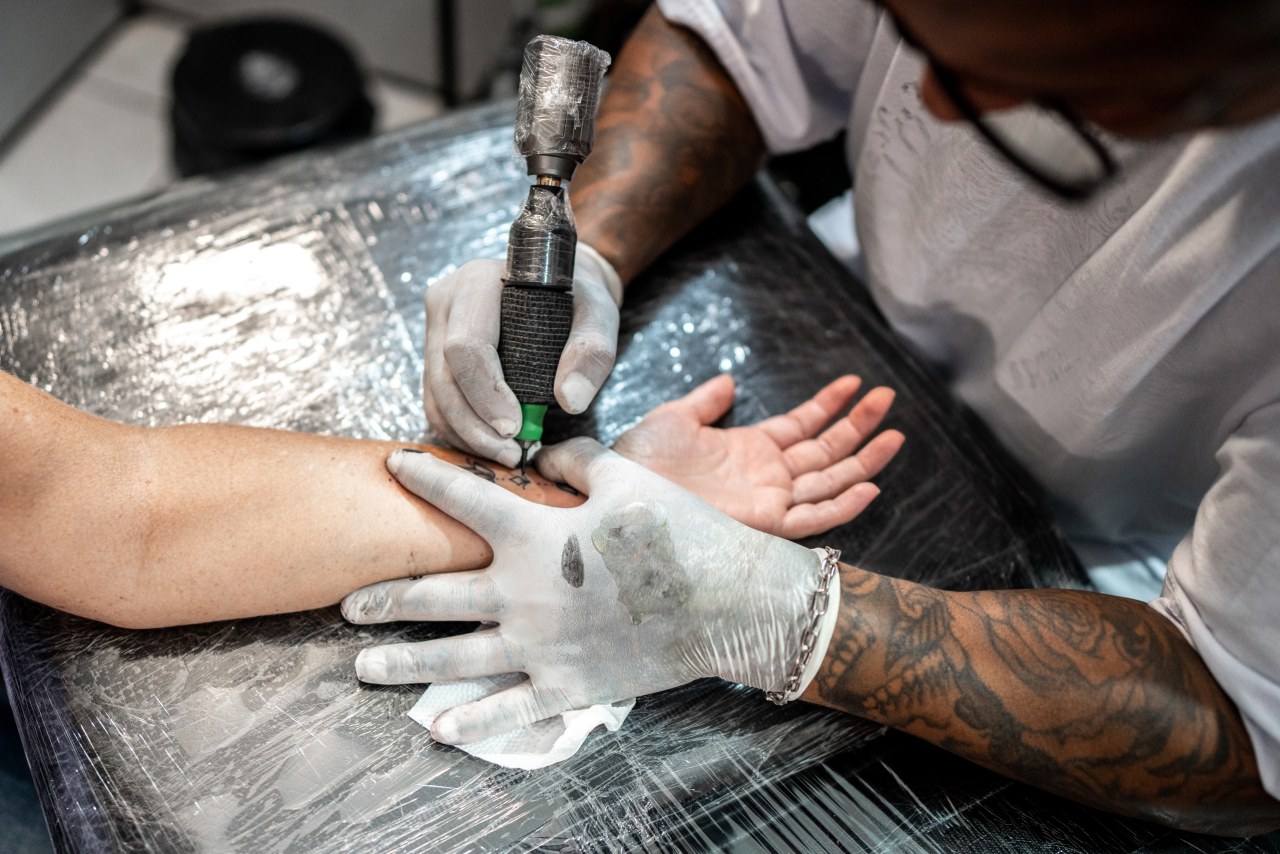 The AI startup that guaranteed job interviews for people getting a tattoo