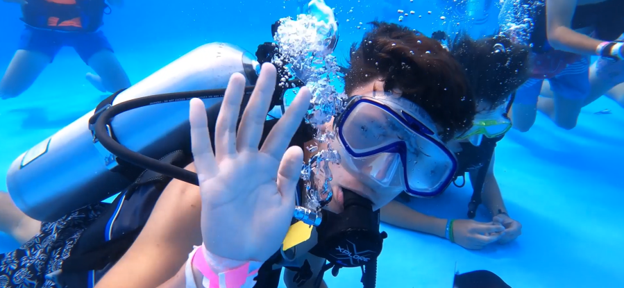 Scouts take a dive while attempting scuba diving at the National Jamboree