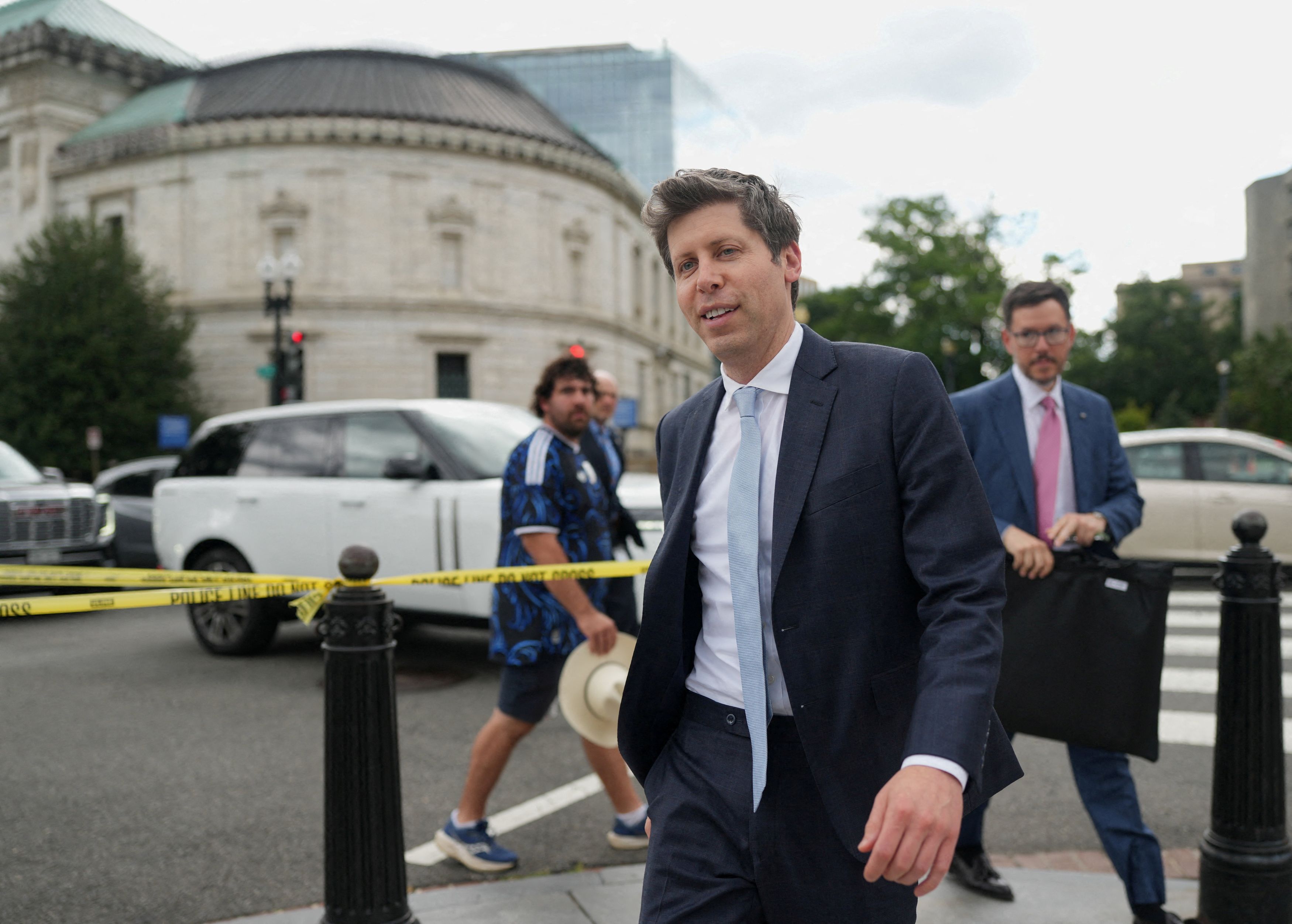 Sam Altman courts Washington as OpenAI pushes a powerful new AI