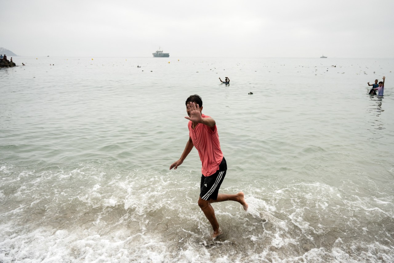 Why did thousands of migrants enter a tiny Spanish exclave in Africa?