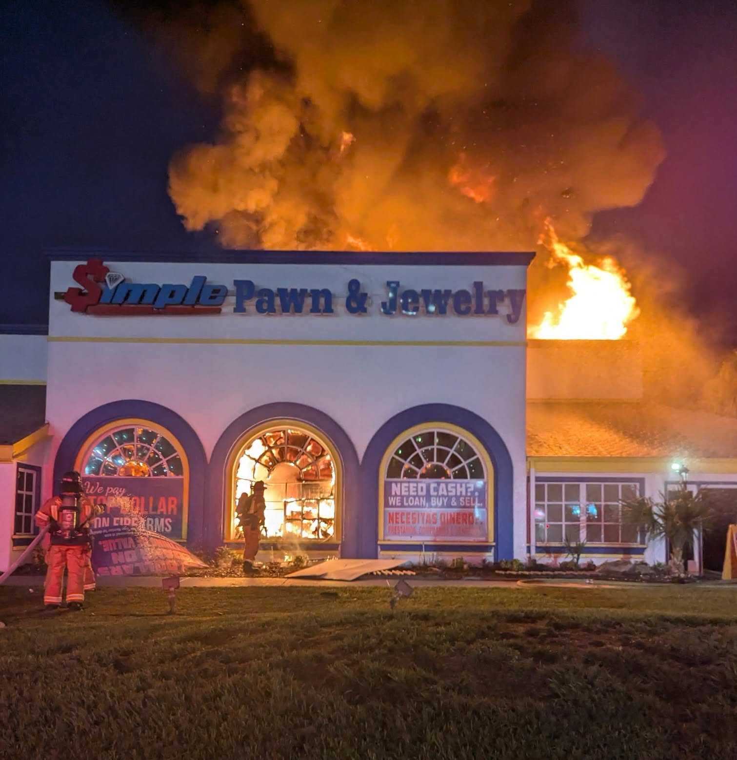 Photos: Firefighters battle massive fire at Kissimmee pawn shop