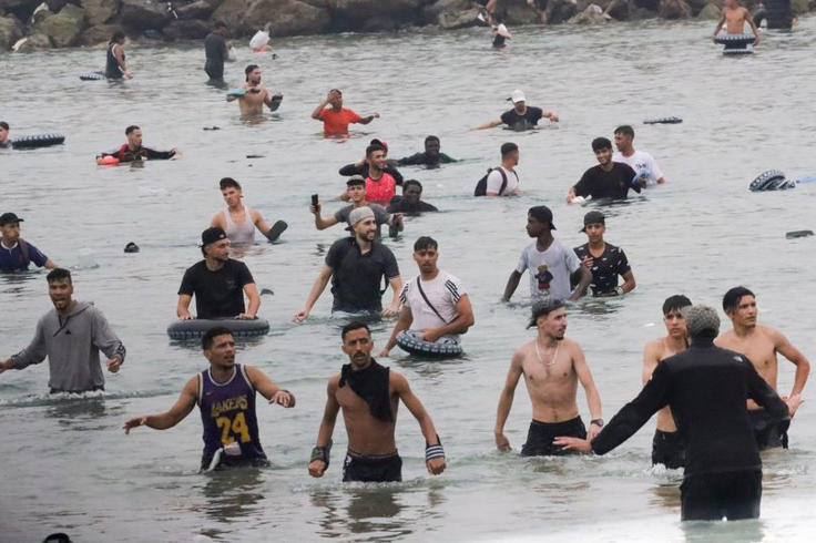 A group of migrants near the Tarajal border crossing in Ceuta, Spain, 31 July 2026
