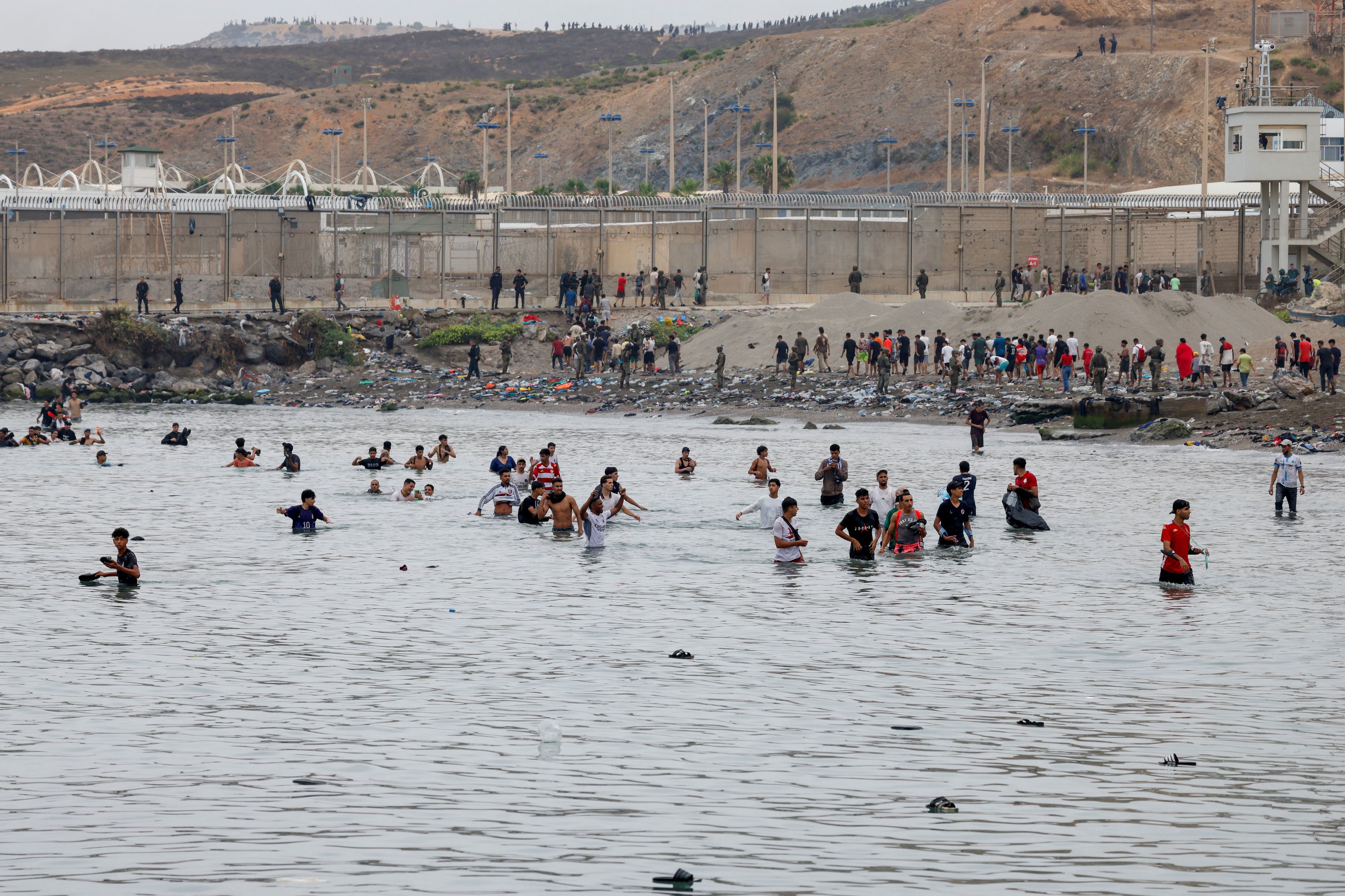 Migrants overrun a Spanish outpost, stirring European outrage