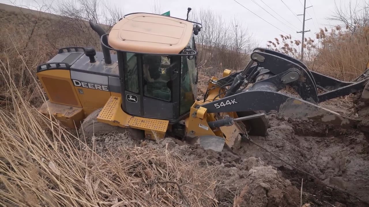They tried pulling the 50,000-pound loader out, then it sank even ...