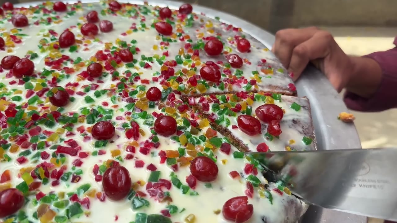 Village granny makes a giant tutti frutti cake from scratch
