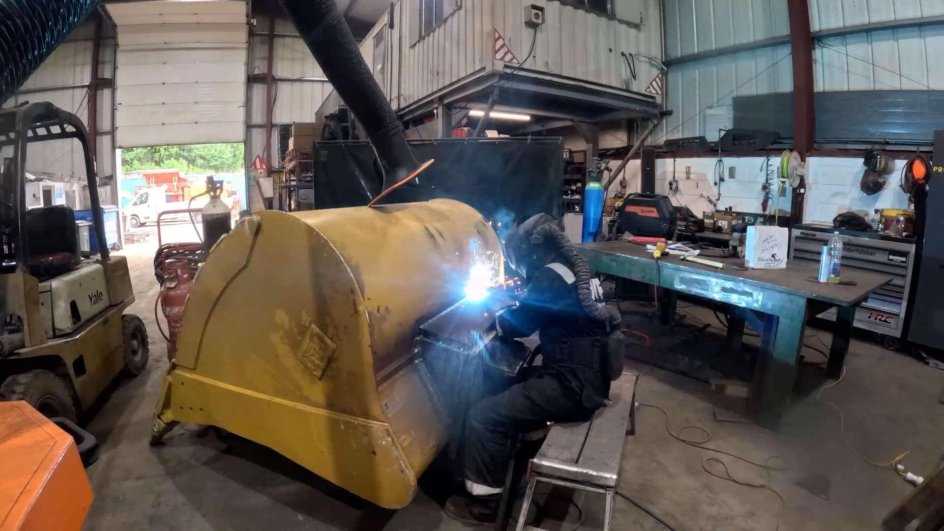 Transforming a worn out excavator bucket into a heavy duty attachment