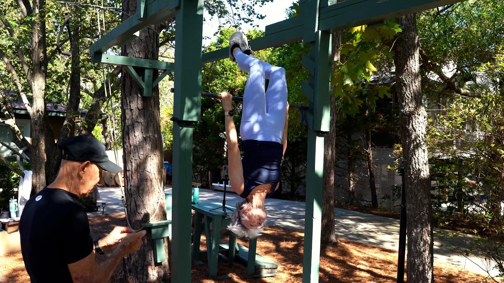 Oldest person to perform an inverted bar hang (female) - Ginny MacColl ...