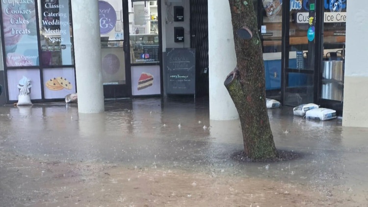 Flood water rose above her bakery's door sill in Five Points