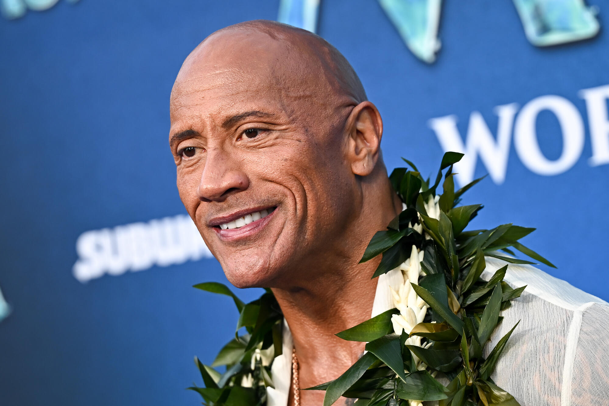 Dwayne Johnson receives Disney Legends Award at D23 from Emily Blunt